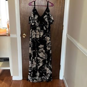 Fashion to figure. Size 2. Black floral dress. Ties around the waist.
